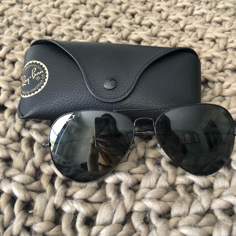 All black Ray Bans